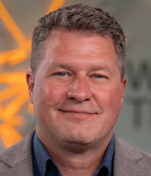 Headshot of Mark Kunar, CEO, DHL Supply Chain North America.